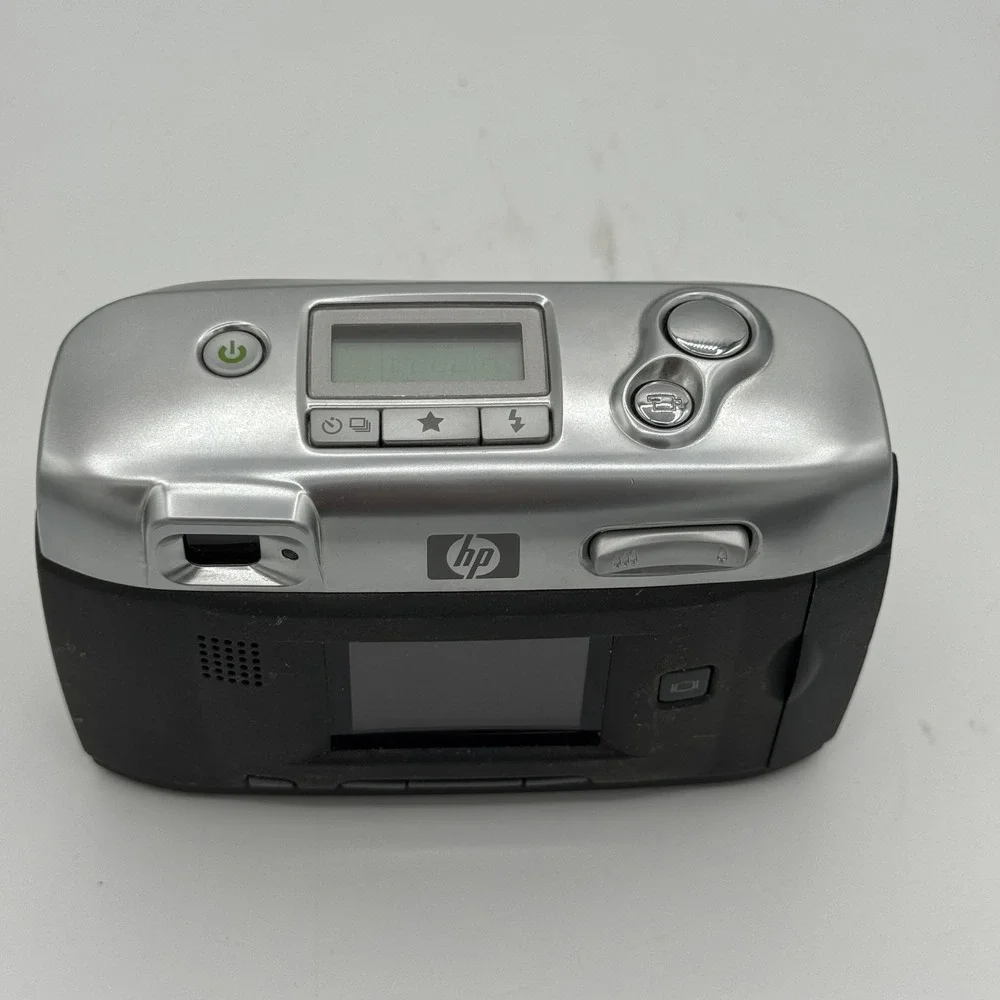 HP Photosmart 720 Digital Camera 3.3MP 3x Optical Zoom Silver Black Q2164A